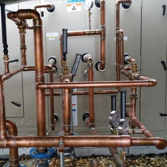 Slide of SJ Plumbing and Mechanical Building Services