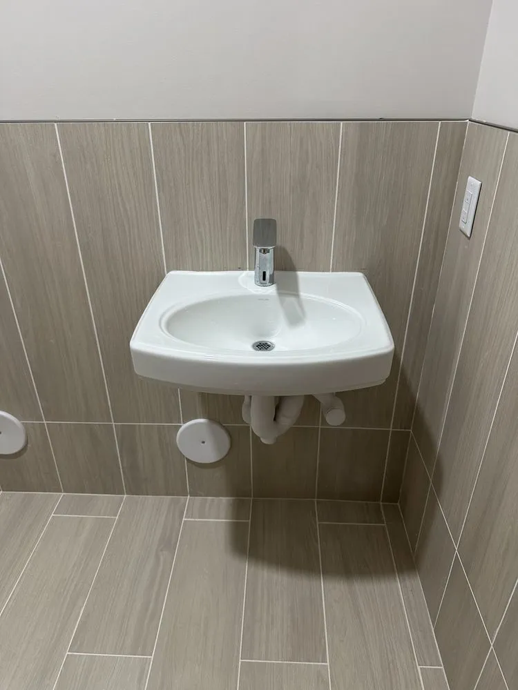 Slide of SJA Plumbing and Services