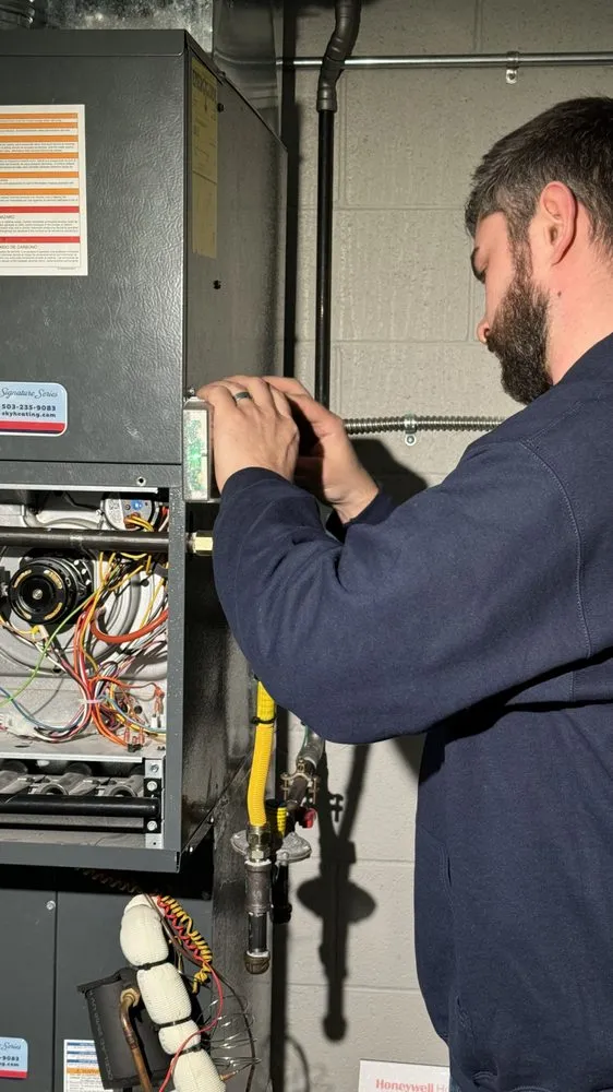 Slide of Sky Heating, AC, Plumbing & Electrical