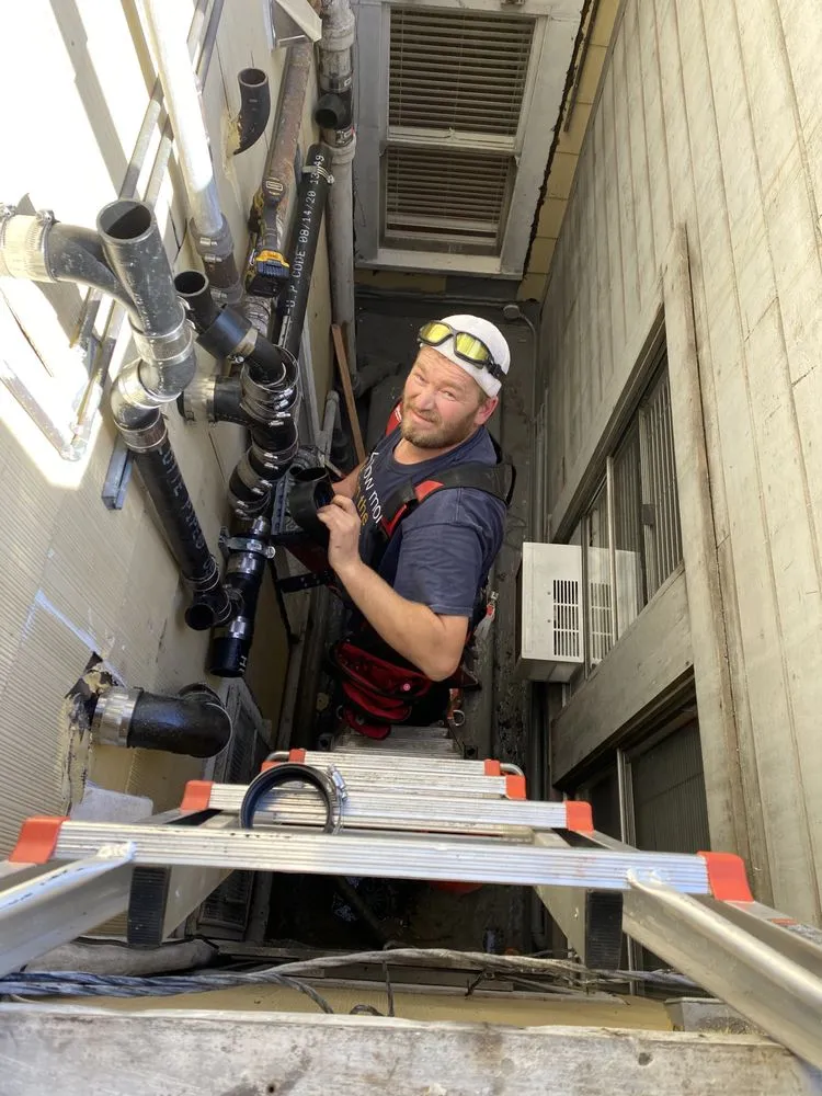 Slide of Smiling Viking Plumbing