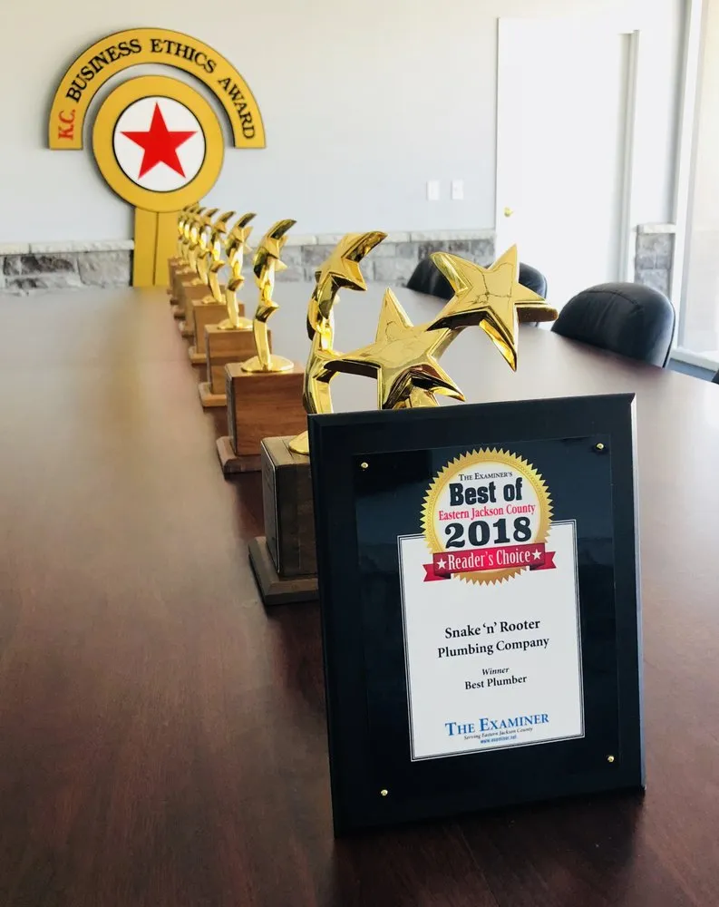 Slide of Snake 'n' Rooter Plumbing Company