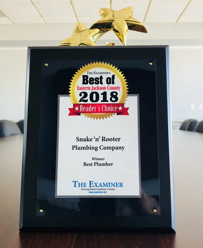 Slide of Snake 'n' Rooter Plumbing Company