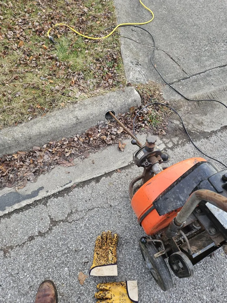 Slide of SnakeA Drain Plumbing