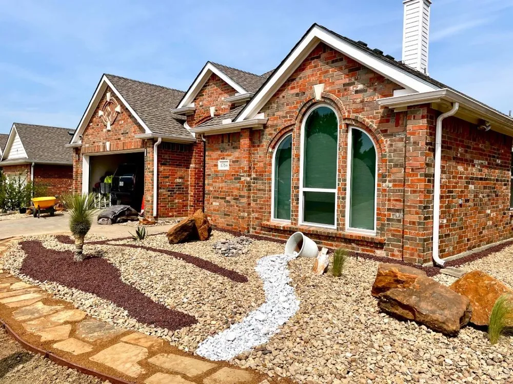 Slide of Sod & landscape installation by Blum