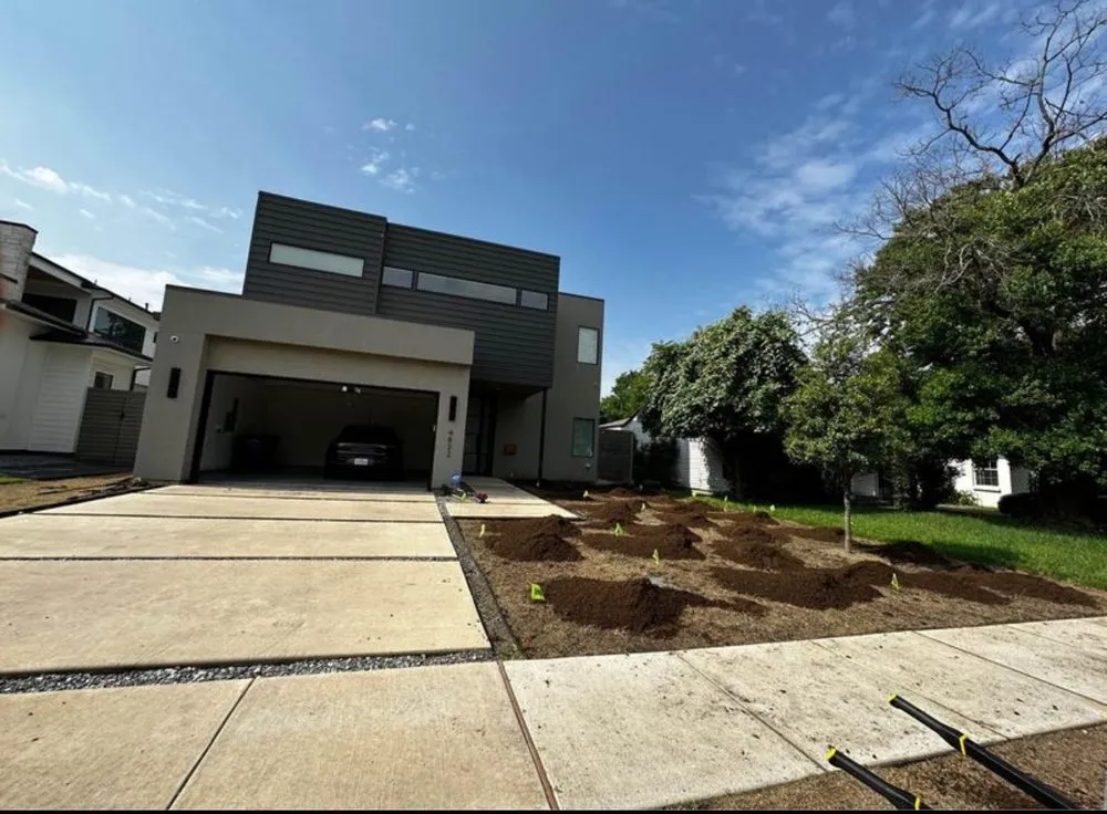 Slide of Sod & landscape installation by Blum