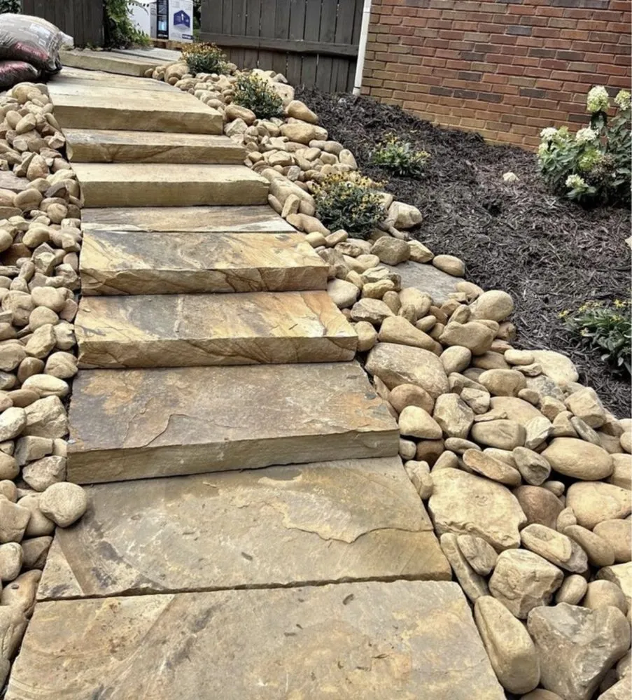 Slide of Sod & landscape installation by Blum