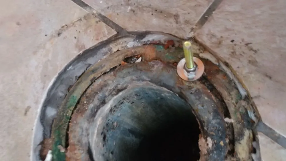 Slide of Someonez Cleaning Drains and More