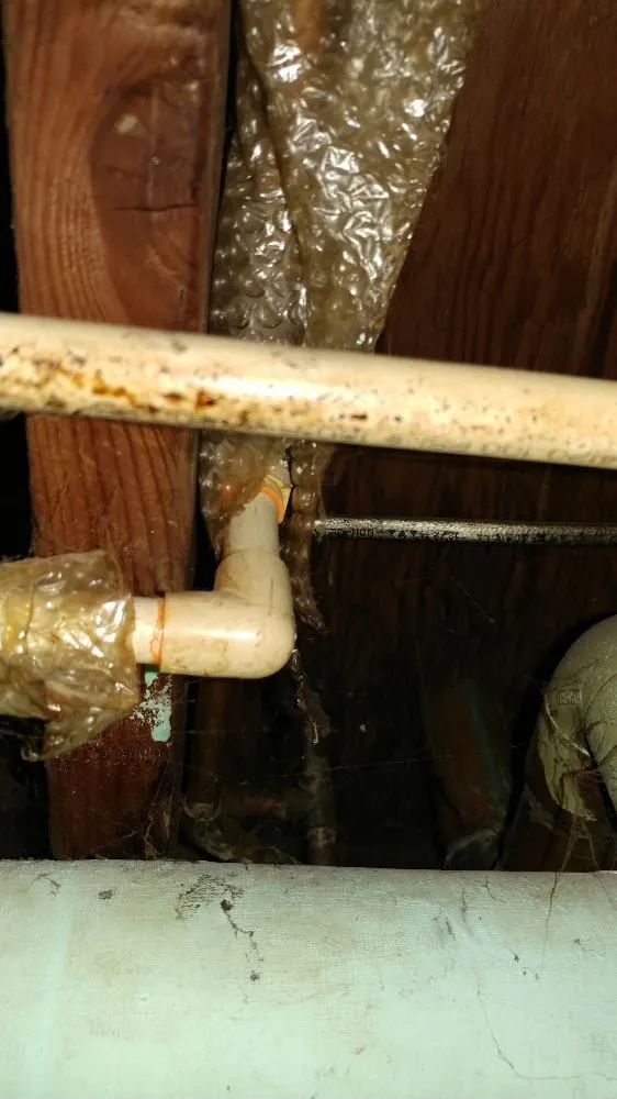 Slide of Someonez Cleaning Drains and More