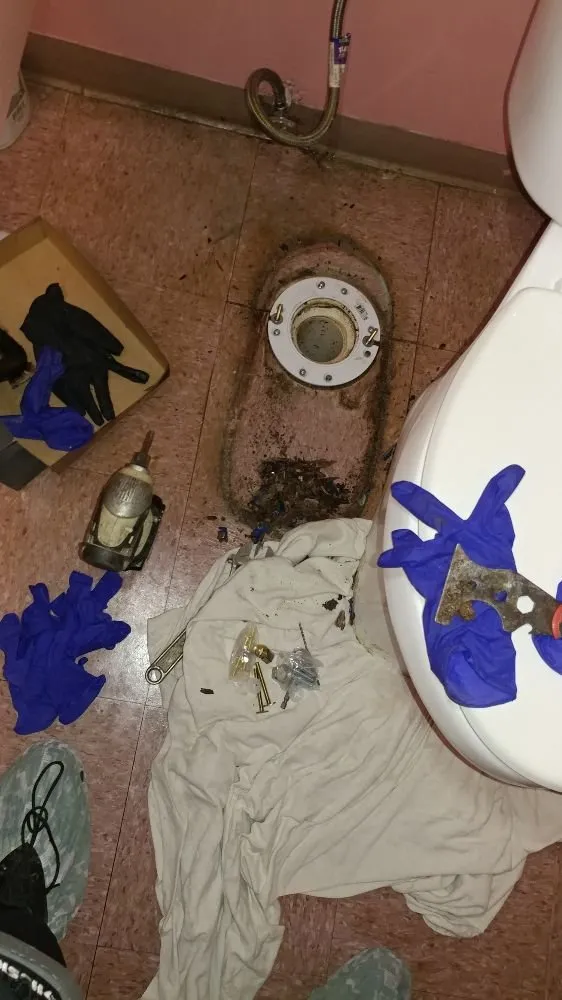 Slide of Someonez Cleaning Drains and More