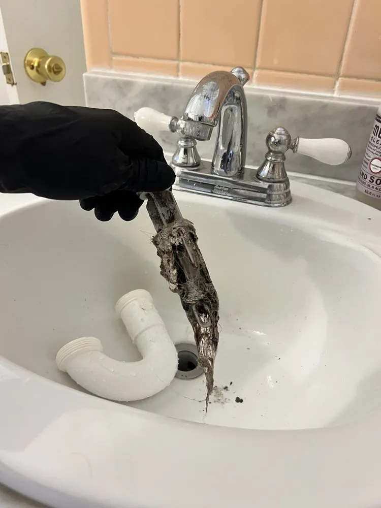 Slide of Sons Of Plumbing