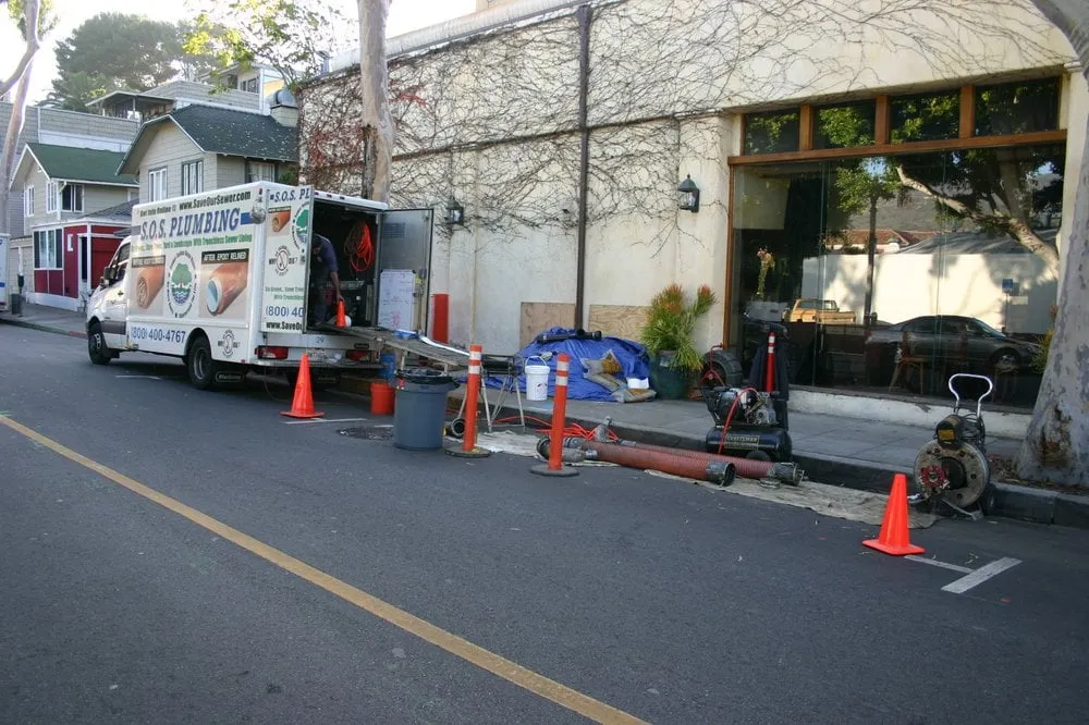 Slide of SOS Plumbing Rooter