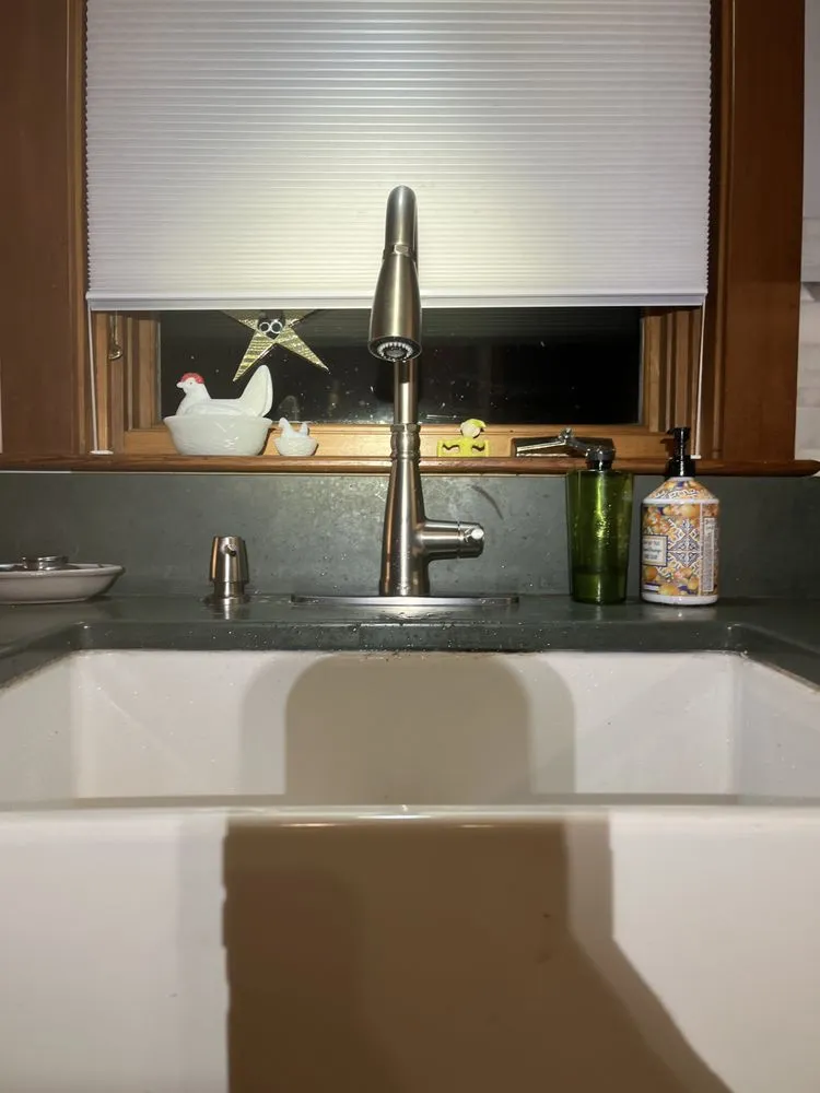 Slide of SOS Plumbing Solutions