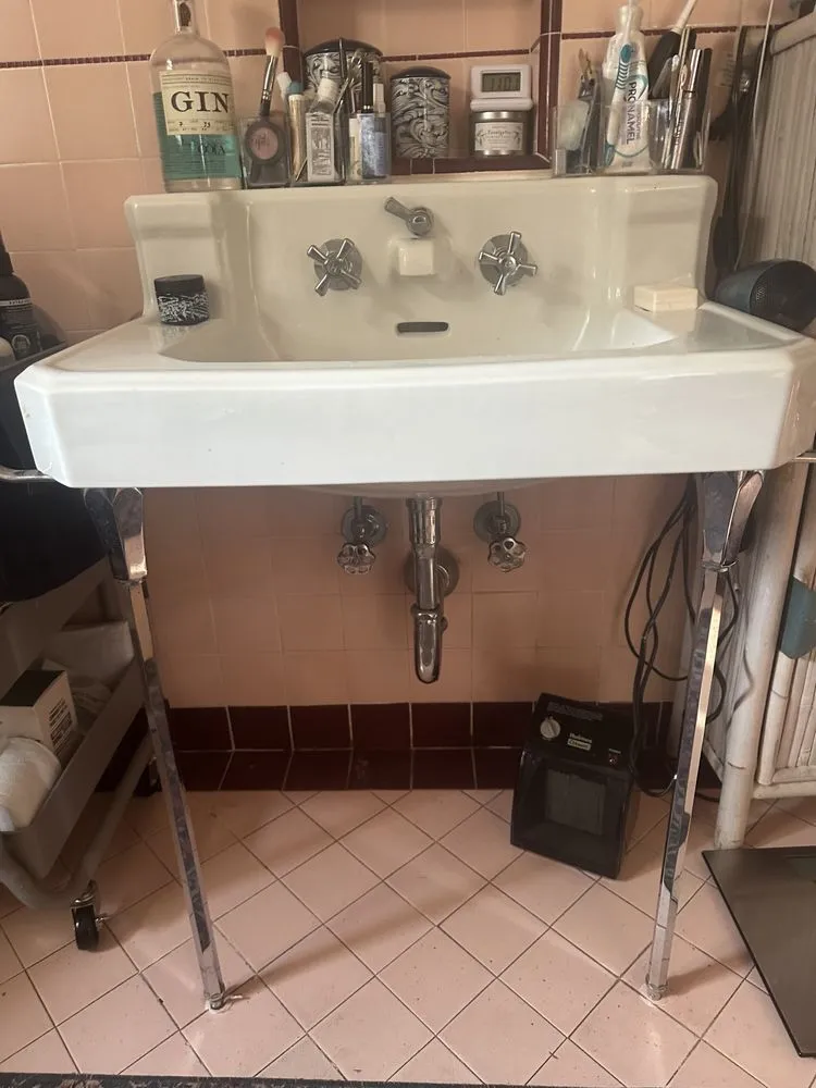 Slide of Souza and Vivian Plumbing Company