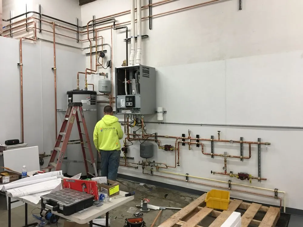 Slide of Spectrum Plumbing and Heating LLC