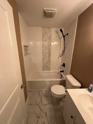 ST Plumbing and Remodeling Logo