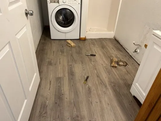 Strong Man Handyman Services Logo