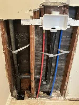 Supreme Rooter N Plumbing Logo