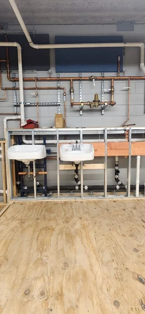 Slide of Synergy Plumbing and Backflow Testing