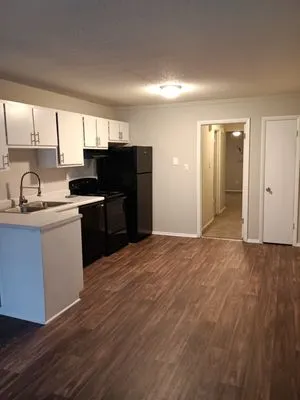 T & C Gardening Home Improvements Logo