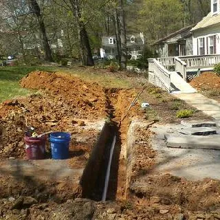 Slide of T C Sewer & Water