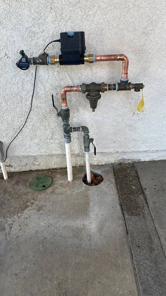 Slide of T Max Plumbing Services