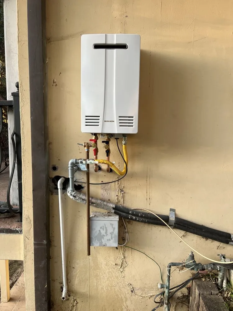 Slide of T Max Plumbing Services