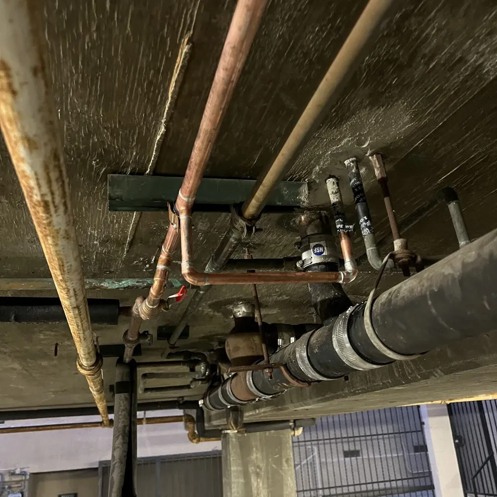 Slide of T Max Plumbing Services