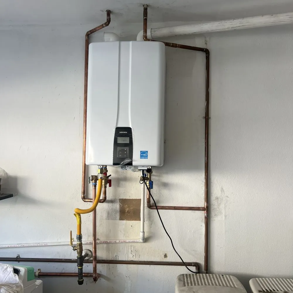 Slide of T Max Plumbing Services