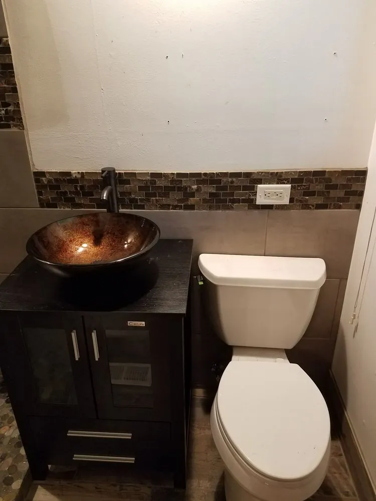 Slide of Tacc Plumbing LLC