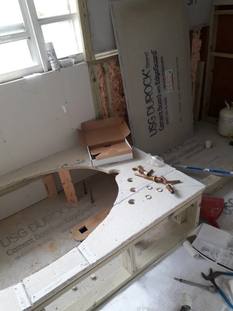 Slide of TAPMAN PLUMBING