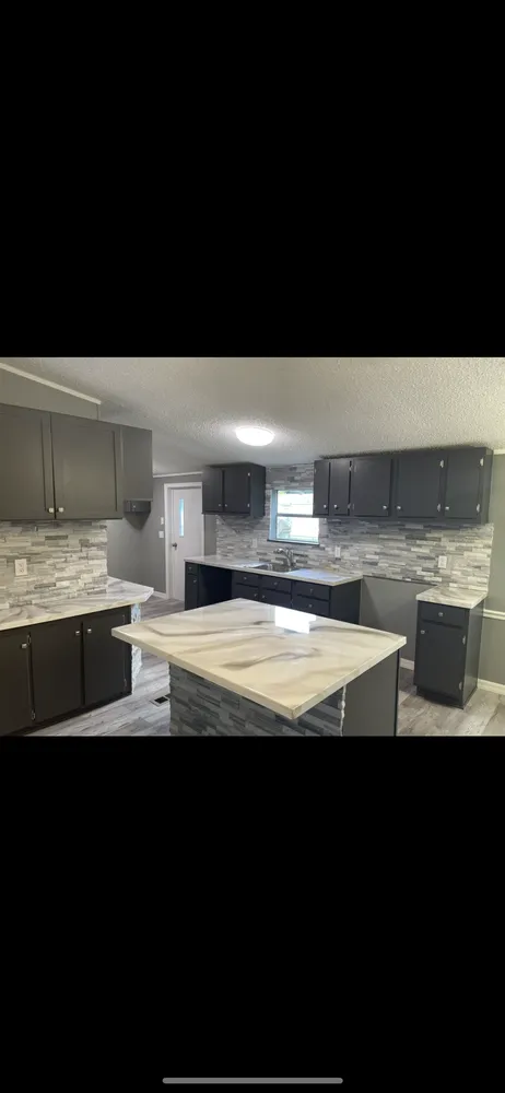 Slide of Taylor Made Renovations