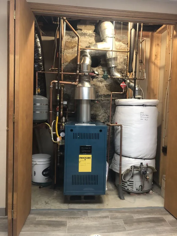 Slide of TC Plumbing & Heating