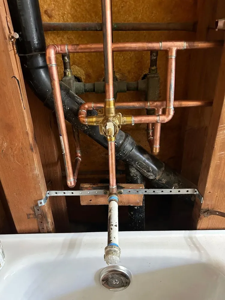 Slide of T&C Plumbing Company