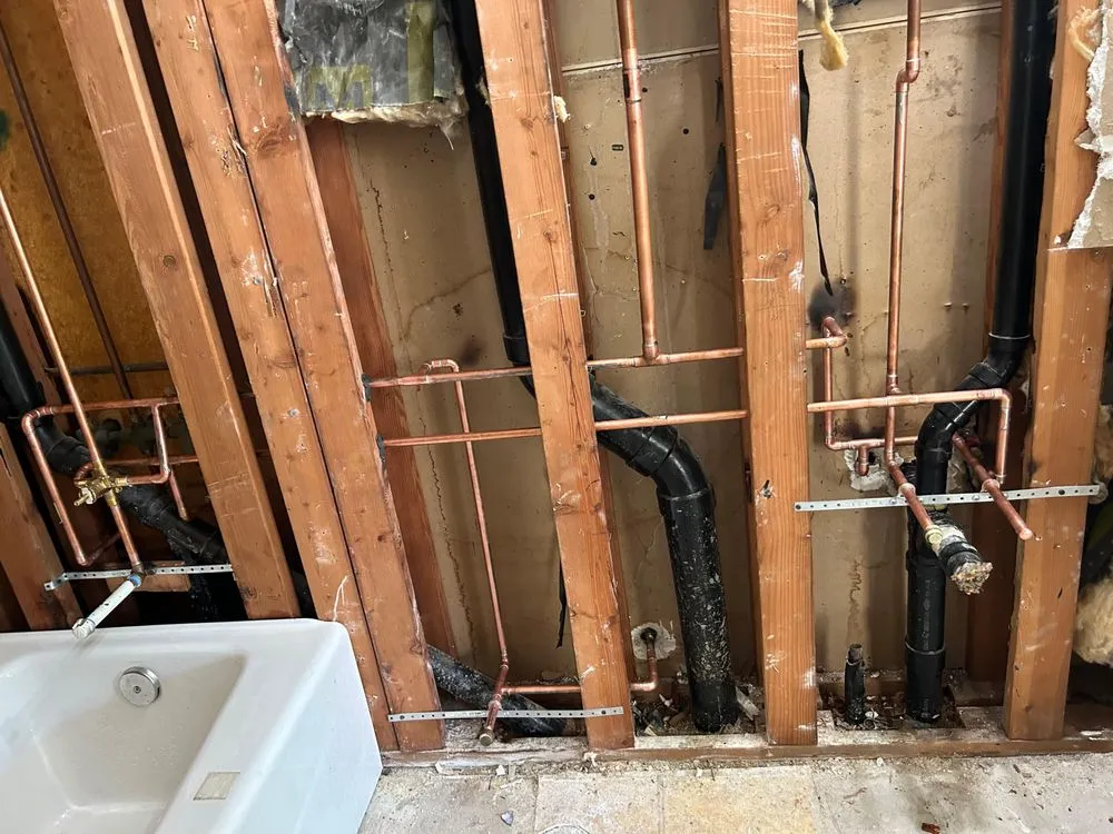 Slide of T&C Plumbing Company