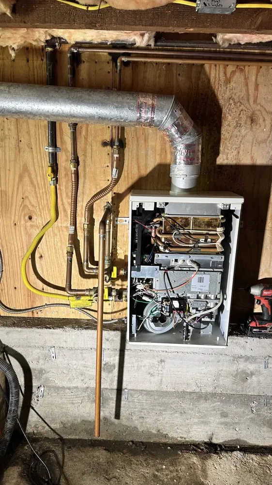 Slide of TCA Plumbing and heating Services