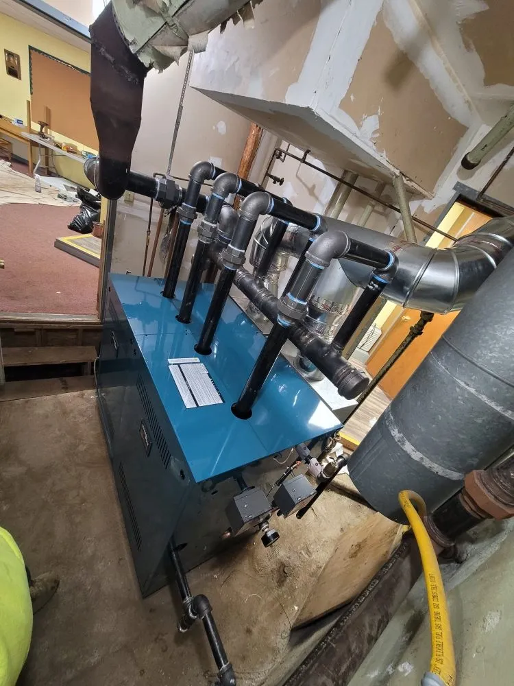 Slide of T&E Plumbing and Heating