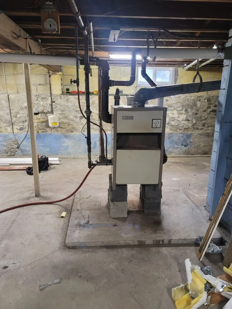 Slide of T&E Plumbing and Heating