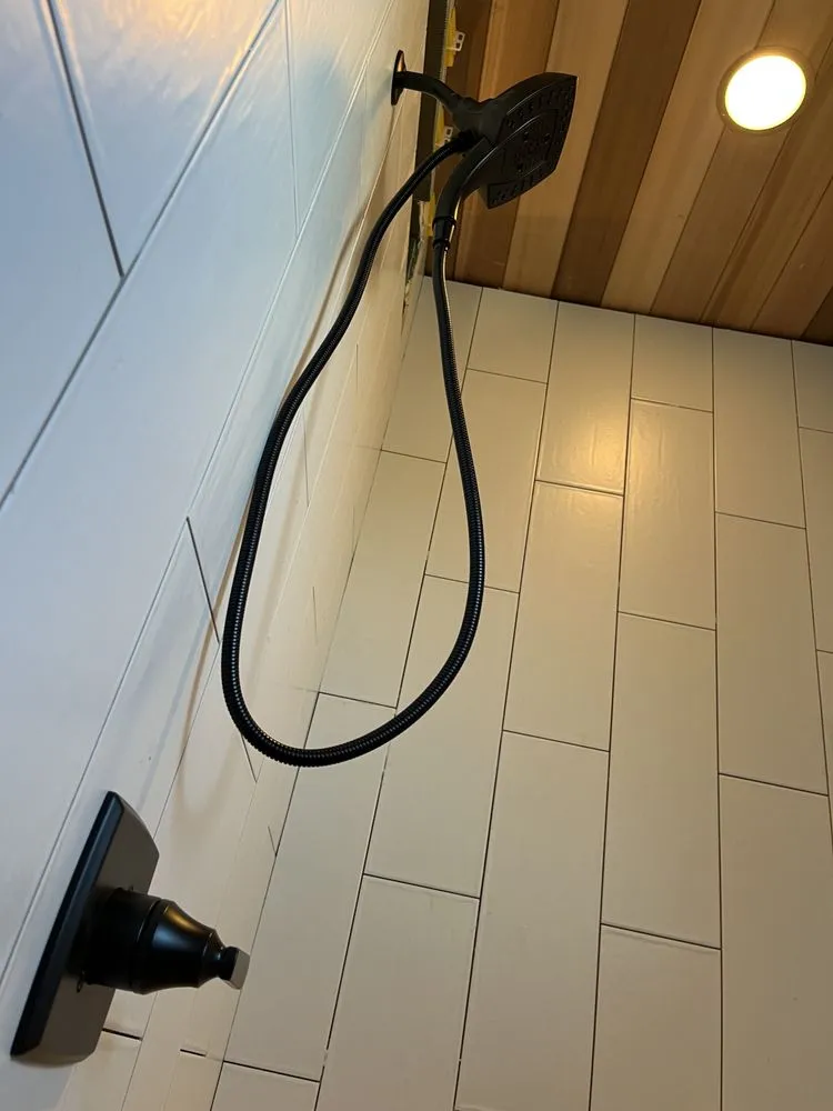 Slide of Team Thompson Plumbing