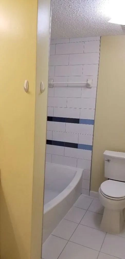 Slide of T&f Tile and Floors