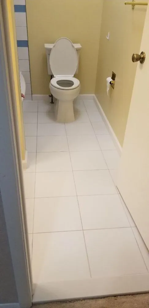 Slide of T&f Tile and Floors