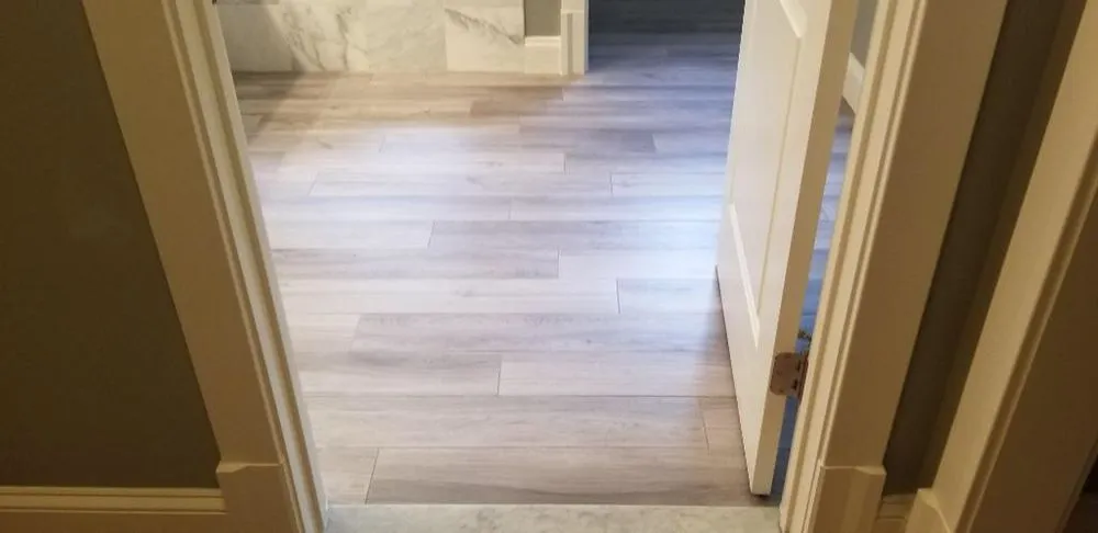 Slide of T&f Tile and Floors