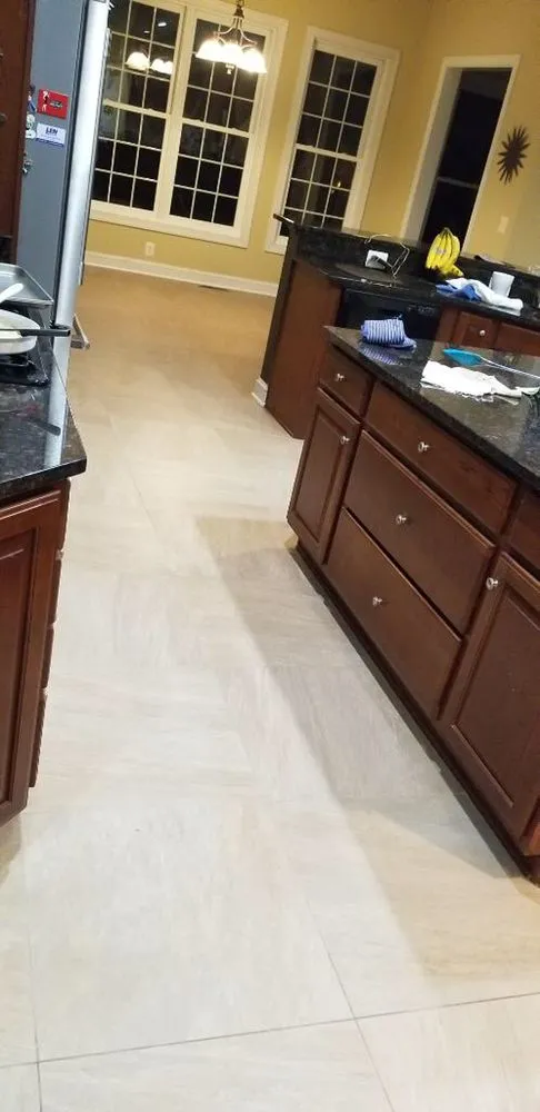 Slide of T&f Tile and Floors