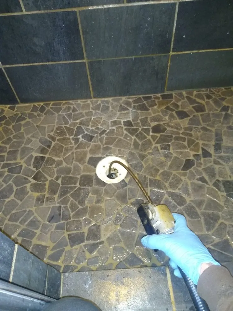 Slide of That Drain Guy