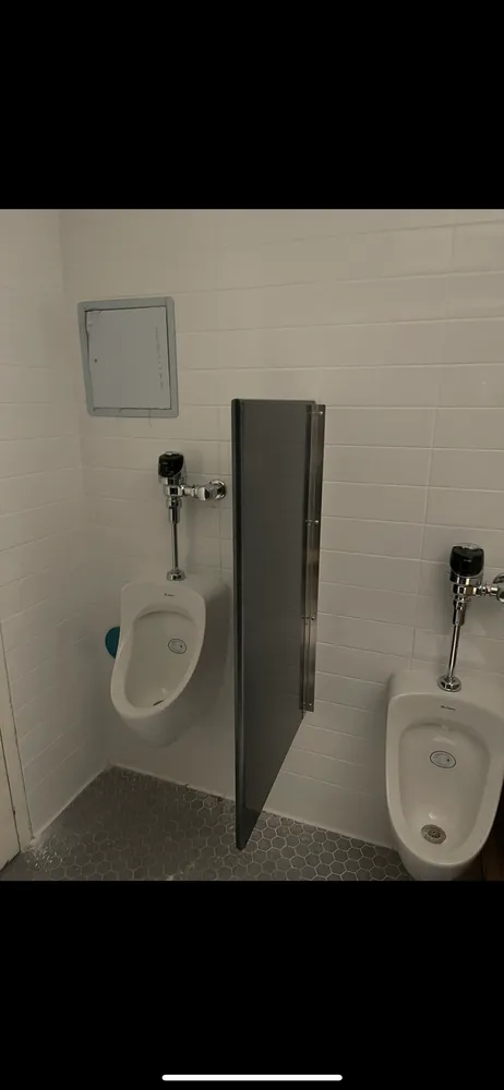 Slide of The Americans Plumber