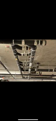 The Americans Plumber Logo