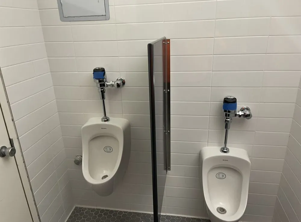 Slide of The Americans Plumber