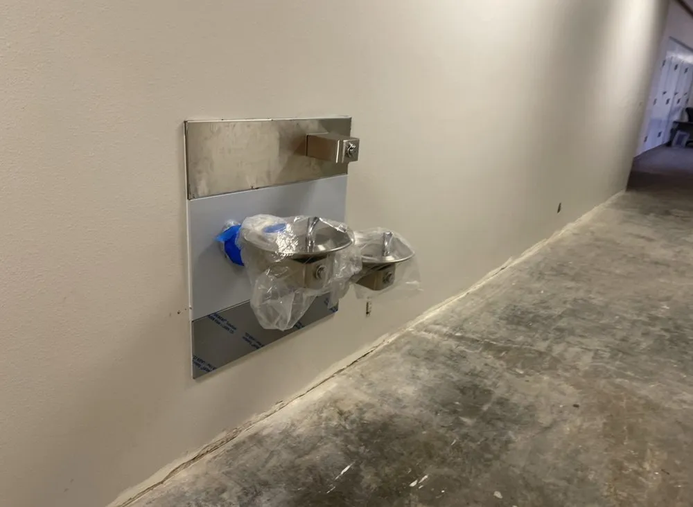 Slide of The Americans Plumber