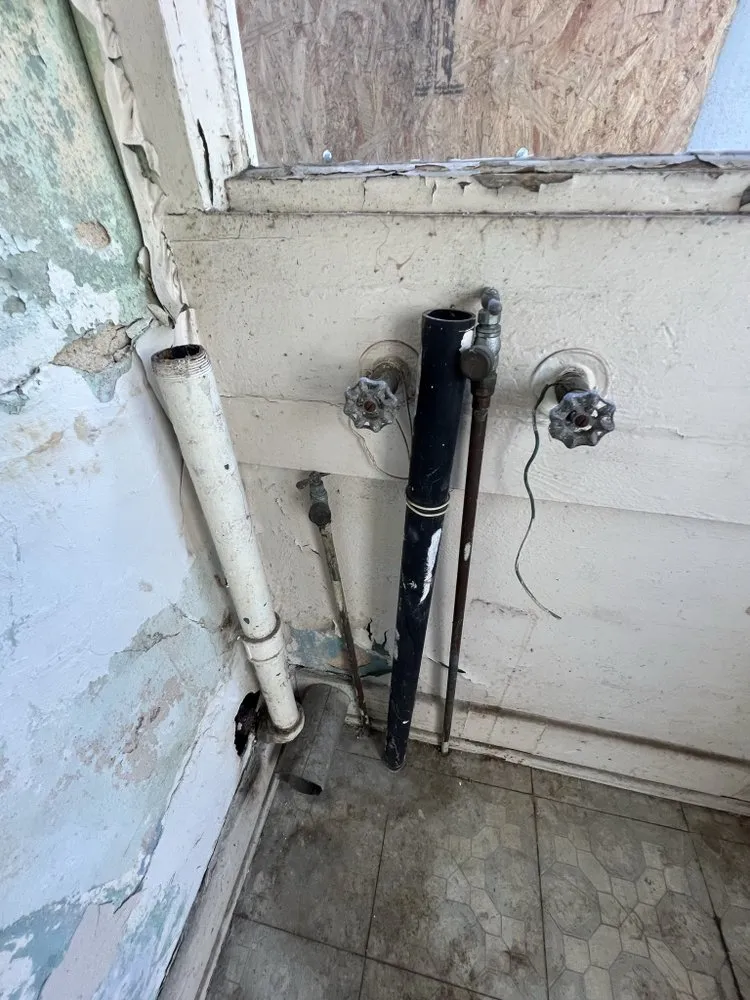 Slide of The Americans Plumber