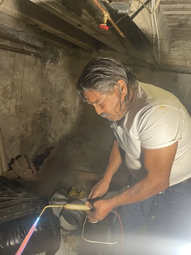 Slide of The Blue Brothers Plumbing