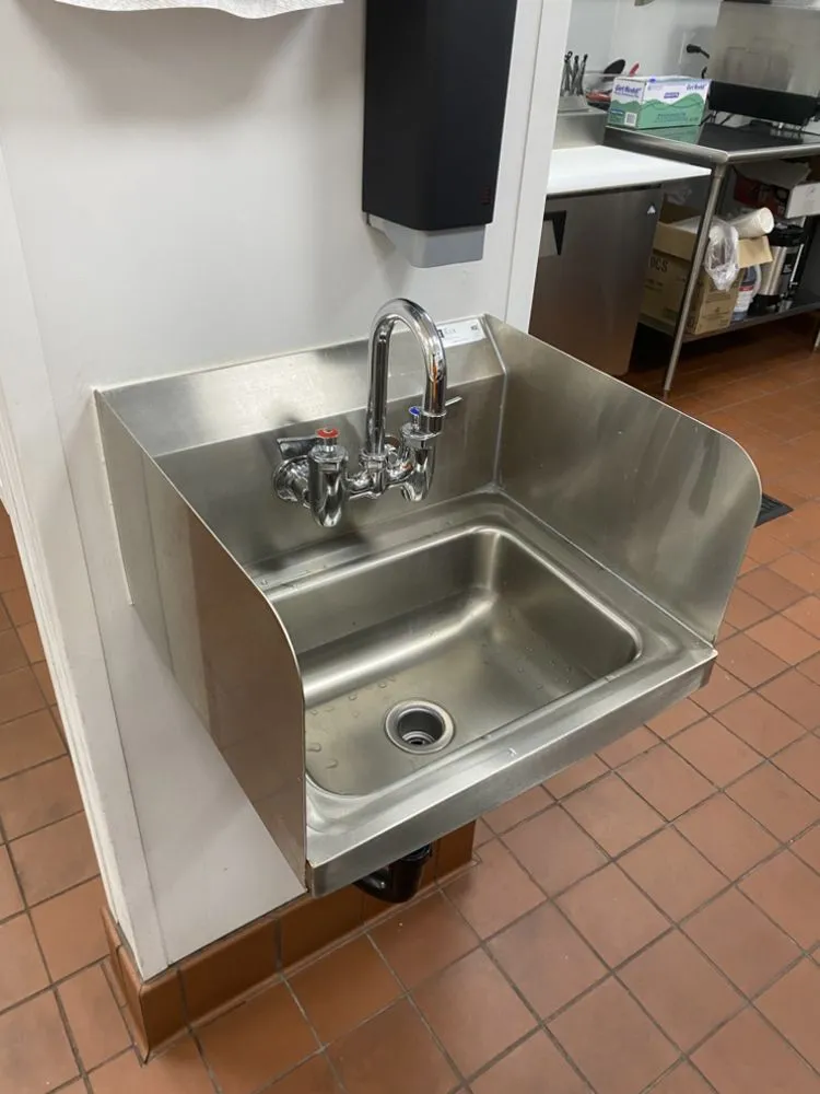 Slide of The Cardenas Plumber